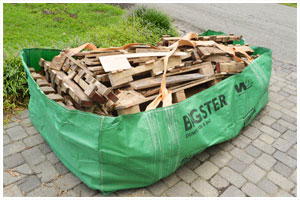 Bagster dumpster full of wood