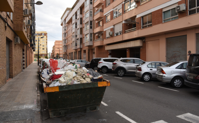 Full dumpster on a city street