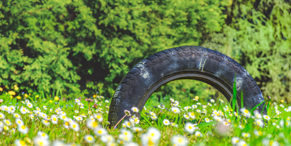 Old tire in the middle of a field