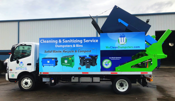 Commercial dumpster cleaning truck