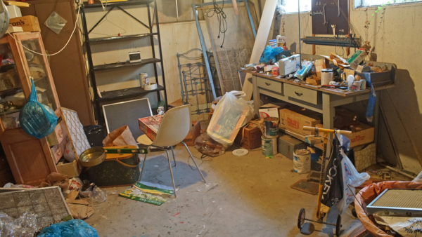 dirty basement with dust and random junk