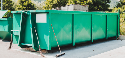 Clean roll-off dumpster in parking lot