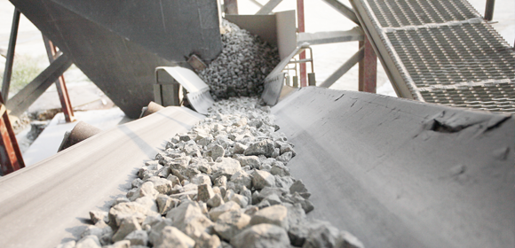 clean load a dumpster with concrete for recycling purposes