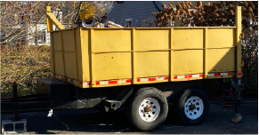 Dump trailer in residential driveway