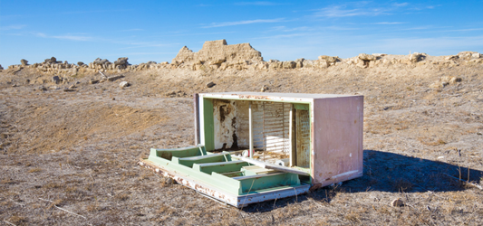 Old fridge illegally dumped in the desert
