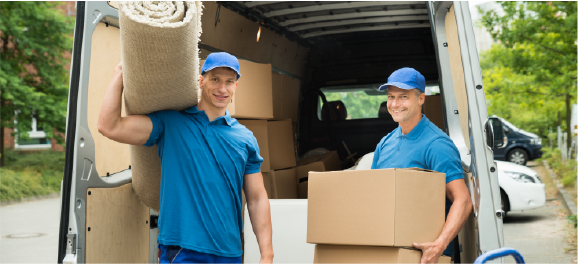 junk removal crew holding carpeting and boxes