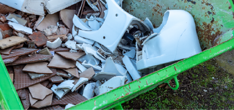 bathroom remodel debris in dumpster