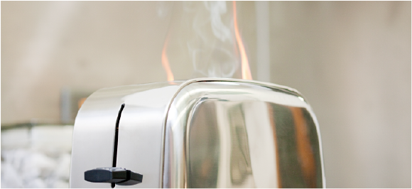 flames coming out of toaster in kitchen