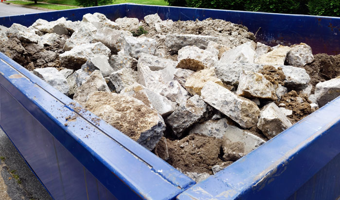 plan ahead for your concrete dumpster rental