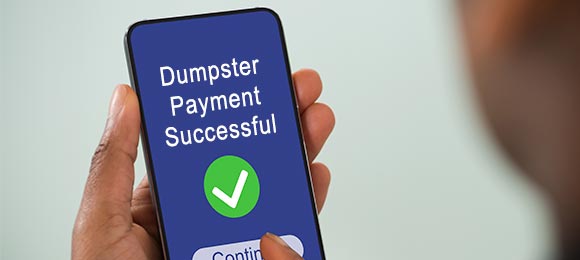 smart phone with "dumpster payment successful" message