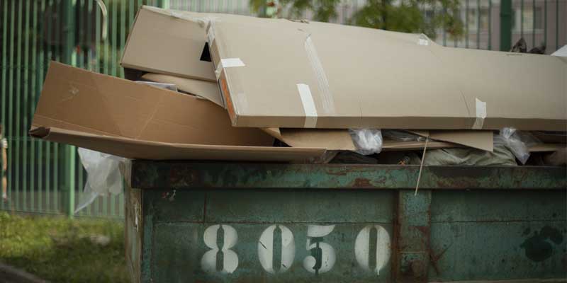 dumpster full of cardboard waste