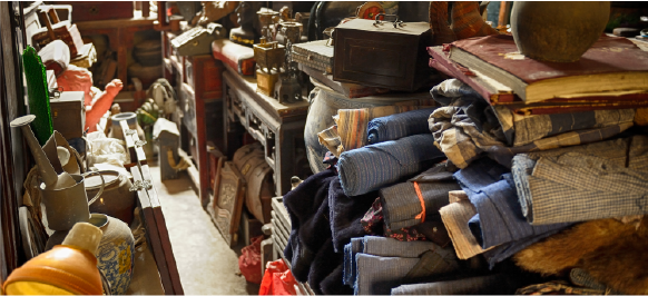 basement filled with piles of old junk