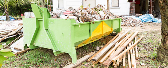 remove items from an overfilled dumpster