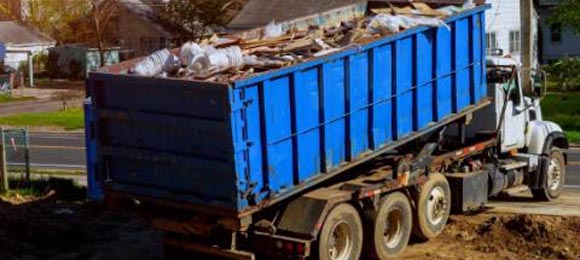 estimate weight of dumpster load