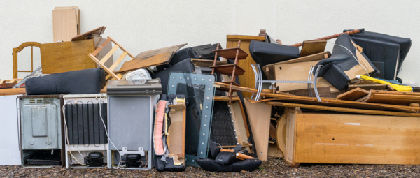 pile of household junk and furniture