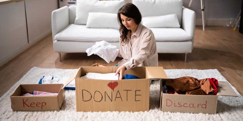 woman sorting donation items