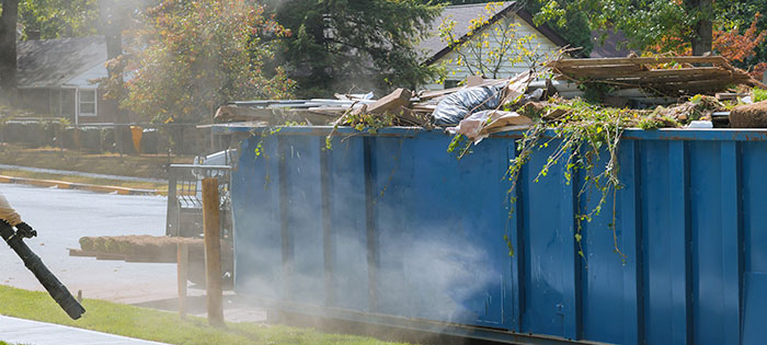 dumpster in street