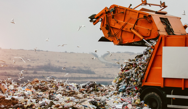 Trash is compacted daily in landfills