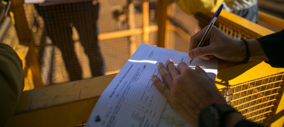 signing a dumpster rental permit application