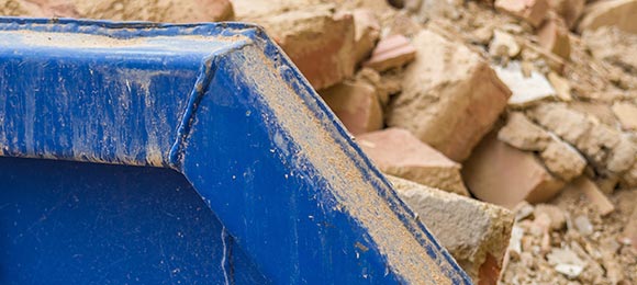 close-up view of concrete in a dumpster