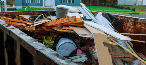 10 yard dumpster filled with debris