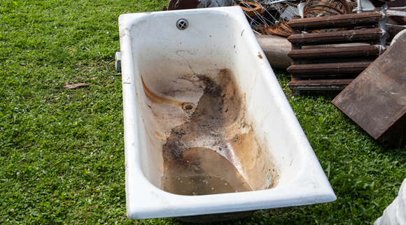 old bathtub in yard