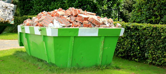 clean load your dumpster with brick