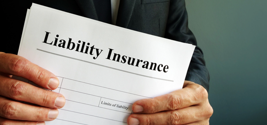 Person reading the terms of a liability insurance contract