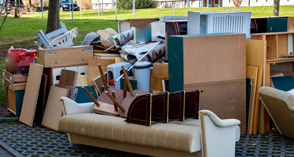 pile of household junk sitting at curb