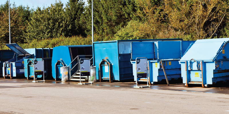 recycling containers outside recycling facility