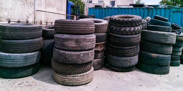 large pile of used car tires