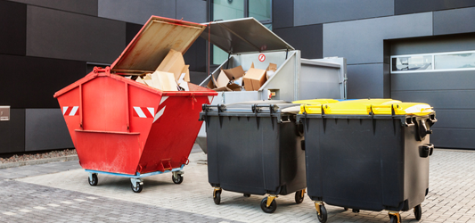 Several dumpster rentals full of cardboard