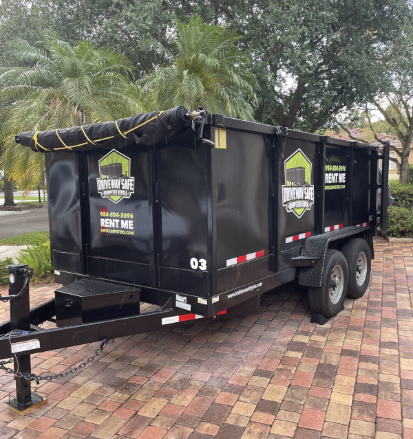 Trailer dumpster placed on a driveway